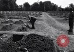 Image of Secretary of State Cordell Hull visits U.S. 4th Division Cemetery Normandy France, 1944, second 11 stock footage video 65675027617