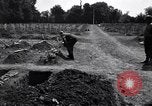 Image of Secretary of State Cordell Hull visits U.S. 4th Division Cemetery Normandy France, 1944, second 13 stock footage video 65675027617