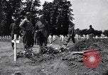 Image of Secretary of State Cordell Hull visits U.S. 4th Division Cemetery Normandy France, 1944, second 15 stock footage video 65675027617