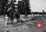 Image of Secretary of State Cordell Hull visits U.S. 4th Division Cemetery Normandy France, 1944, second 18 stock footage video 65675027617