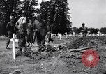Image of Secretary of State Cordell Hull visits U.S. 4th Division Cemetery Normandy France, 1944, second 19 stock footage video 65675027617