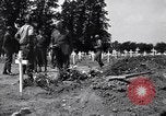 Image of Secretary of State Cordell Hull visits U.S. 4th Division Cemetery Normandy France, 1944, second 20 stock footage video 65675027617