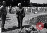 Image of Secretary of State Cordell Hull visits U.S. 4th Division Cemetery Normandy France, 1944, second 22 stock footage video 65675027617