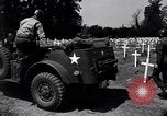 Image of Secretary of State Cordell Hull visits U.S. 4th Division Cemetery Normandy France, 1944, second 30 stock footage video 65675027617