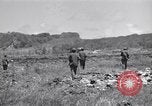 Image of U.S. marines in battle of Saipan Saipan Northern Mariana Islands, 1944, second 17 stock footage video 65675027621
