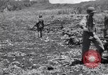 Image of U.S. marines in battle of Saipan Saipan Northern Mariana Islands, 1944, second 49 stock footage video 65675027621