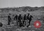 Image of U.S. marines in battle of Saipan Saipan Northern Mariana Islands, 1944, second 55 stock footage video 65675027621