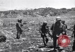 Image of U.S. marines in battle of Saipan Saipan Northern Mariana Islands, 1944, second 59 stock footage video 65675027621