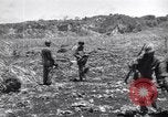 Image of U.S. marines in battle of Saipan Saipan Northern Mariana Islands, 1944, second 61 stock footage video 65675027621