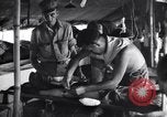 Standbild Mediziner Myitkyina Airdrome Birma, 1944, aus Sekunde 54 historischem Filmmaterial Videoclip 65675027632