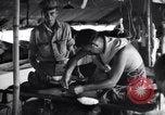 Standbild Mediziner Myitkyina Airdrome Birma, 1944, aus Sekunde 55 historischem Filmmaterial Videoclip 65675027632