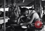 Standbild Mediziner Myitkyina Airdrome Birma, 1944, aus Sekunde 56 historischem Filmmaterial Videoclip 65675027632