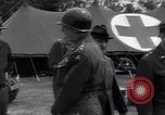 Image of Stimson with Bradley and Patton tour field hospital Cherbourg Normandy France, 1944, second 29 stock footage video 65675027646