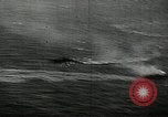 Image of US Navy aircraft attack tokyo bay shipping Tokyo Japan, 1945, second 41 stock footage video 65675027695