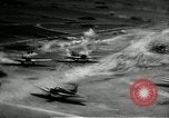 Image of US Navy aircraft attack tokyo bay shipping Tokyo Japan, 1945, second 58 stock footage video 65675027695