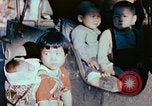 Standbild japanische Kinder nach Zweiten Weltkrieg Tokio Japan, 1945, aus Sekunde 37 historischem Filmmaterial Videoclip 65675027715