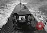 Image of five inch twenty five caliber gun firing after sub surfaces United States USA, 1945, second 6 stock footage video 65675027732