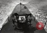 Image of five inch twenty five caliber gun firing after sub surfaces United States USA, 1945, second 7 stock footage video 65675027732