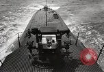 Image of five inch twenty five caliber gun firing after sub surfaces United States USA, 1945, second 9 stock footage video 65675027732