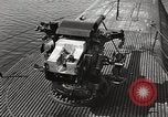 Image of five inch twenty five caliber gun firing after sub surfaces United States USA, 1945, second 17 stock footage video 65675027732