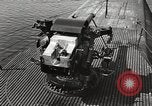 Image of five inch twenty five caliber gun firing after sub surfaces United States USA, 1945, second 18 stock footage video 65675027732