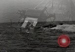 Image of five inch twenty five caliber gun firing after sub surfaces United States USA, 1945, second 22 stock footage video 65675027732