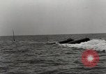 Image of five inch twenty five caliber gun firing after sub surfaces United States USA, 1945, second 23 stock footage video 65675027732