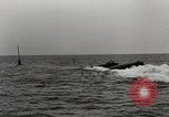 Image of five inch twenty five caliber gun firing after sub surfaces United States USA, 1945, second 24 stock footage video 65675027732