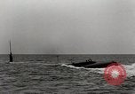 Image of five inch twenty five caliber gun firing after sub surfaces United States USA, 1945, second 26 stock footage video 65675027732
