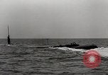 Image of five inch twenty five caliber gun firing after sub surfaces United States USA, 1945, second 27 stock footage video 65675027732