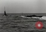 Image of five inch twenty five caliber gun firing after sub surfaces United States USA, 1945, second 28 stock footage video 65675027732
