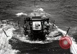 Image of five inch twenty five caliber gun firing after sub surfaces United States USA, 1945, second 32 stock footage video 65675027732
