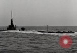 Image of five inch twenty five caliber gun firing after sub surfaces United States USA, 1945, second 35 stock footage video 65675027732