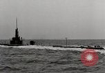 Image of five inch twenty five caliber gun firing after sub surfaces United States USA, 1945, second 36 stock footage video 65675027732