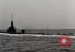 Image of five inch twenty five caliber gun firing after sub surfaces United States USA, 1945, second 37 stock footage video 65675027732