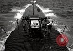Image of five inch twenty five caliber gun firing after sub surfaces United States USA, 1945, second 40 stock footage video 65675027732