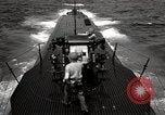 Image of five inch twenty five caliber gun firing after sub surfaces United States USA, 1945, second 41 stock footage video 65675027732