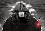 Image of five inch twenty five caliber gun firing after sub surfaces United States USA, 1945, second 42 stock footage video 65675027732
