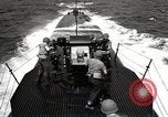 Image of five inch twenty five caliber gun firing after sub surfaces United States USA, 1945, second 46 stock footage video 65675027732