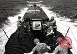 Image of five inch twenty five caliber gun firing after sub surfaces United States USA, 1945, second 47 stock footage video 65675027732