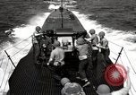 Image of five inch twenty five caliber gun firing after sub surfaces United States USA, 1945, second 48 stock footage video 65675027732
