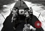 Image of five inch twenty five caliber gun firing after sub surfaces United States USA, 1945, second 51 stock footage video 65675027732