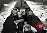 Image of five inch twenty five caliber gun firing after sub surfaces United States USA, 1945, second 52 stock footage video 65675027732