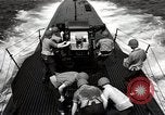 Image of five inch twenty five caliber gun firing after sub surfaces United States USA, 1945, second 53 stock footage video 65675027732