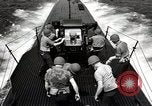 Image of five inch twenty five caliber gun firing after sub surfaces United States USA, 1945, second 54 stock footage video 65675027732