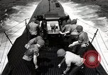 Image of five inch twenty five caliber gun firing after sub surfaces United States USA, 1945, second 56 stock footage video 65675027732