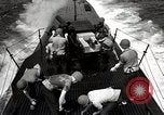 Image of five inch twenty five caliber gun firing after sub surfaces United States USA, 1945, second 58 stock footage video 65675027732