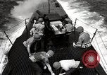Image of five inch twenty five caliber gun firing after sub surfaces United States USA, 1945, second 59 stock footage video 65675027732