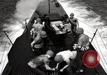 Image of five inch twenty five caliber gun firing after sub surfaces United States USA, 1945, second 60 stock footage video 65675027732