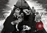 Image of five inch twenty five caliber gun firing after sub surfaces United States USA, 1945, second 61 stock footage video 65675027732